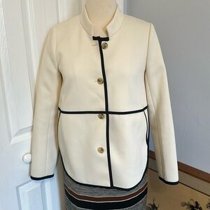 J. Crew cream and black blazer